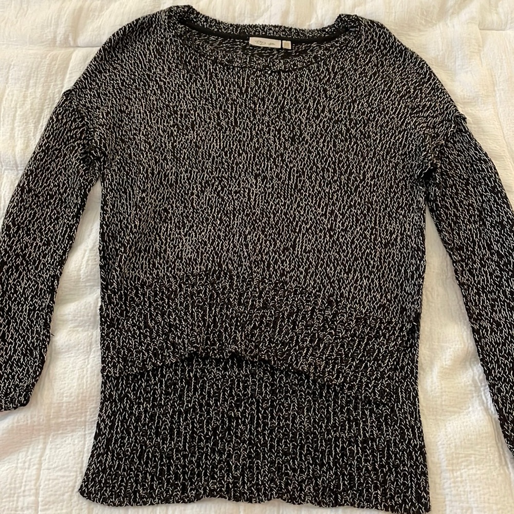 Black/White knitted long sleeve sweater. Longer in the back& has cute elbow pads